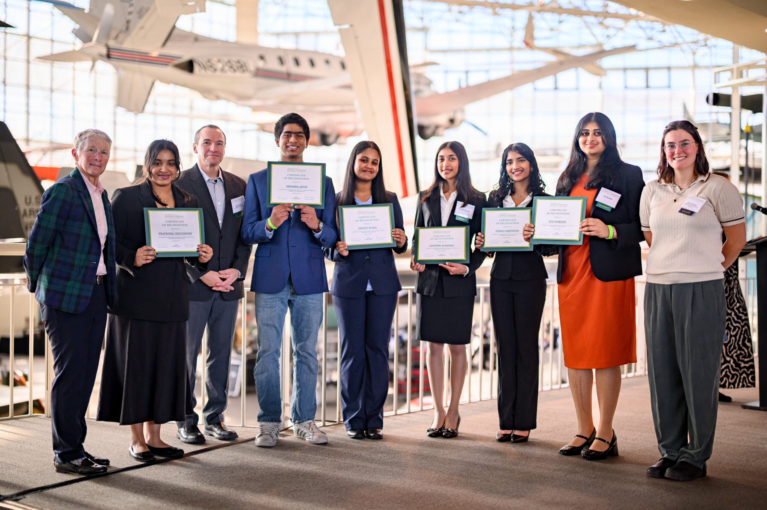 WAJAS fellows holding up their certificates